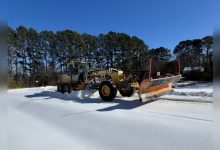 VDOT crews work around the clock using heavy equipment to clear secondary roads across Fredericksburg