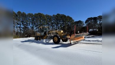 VDOT crews work around the clock using heavy equipment to clear secondary roads across Fredericksburg